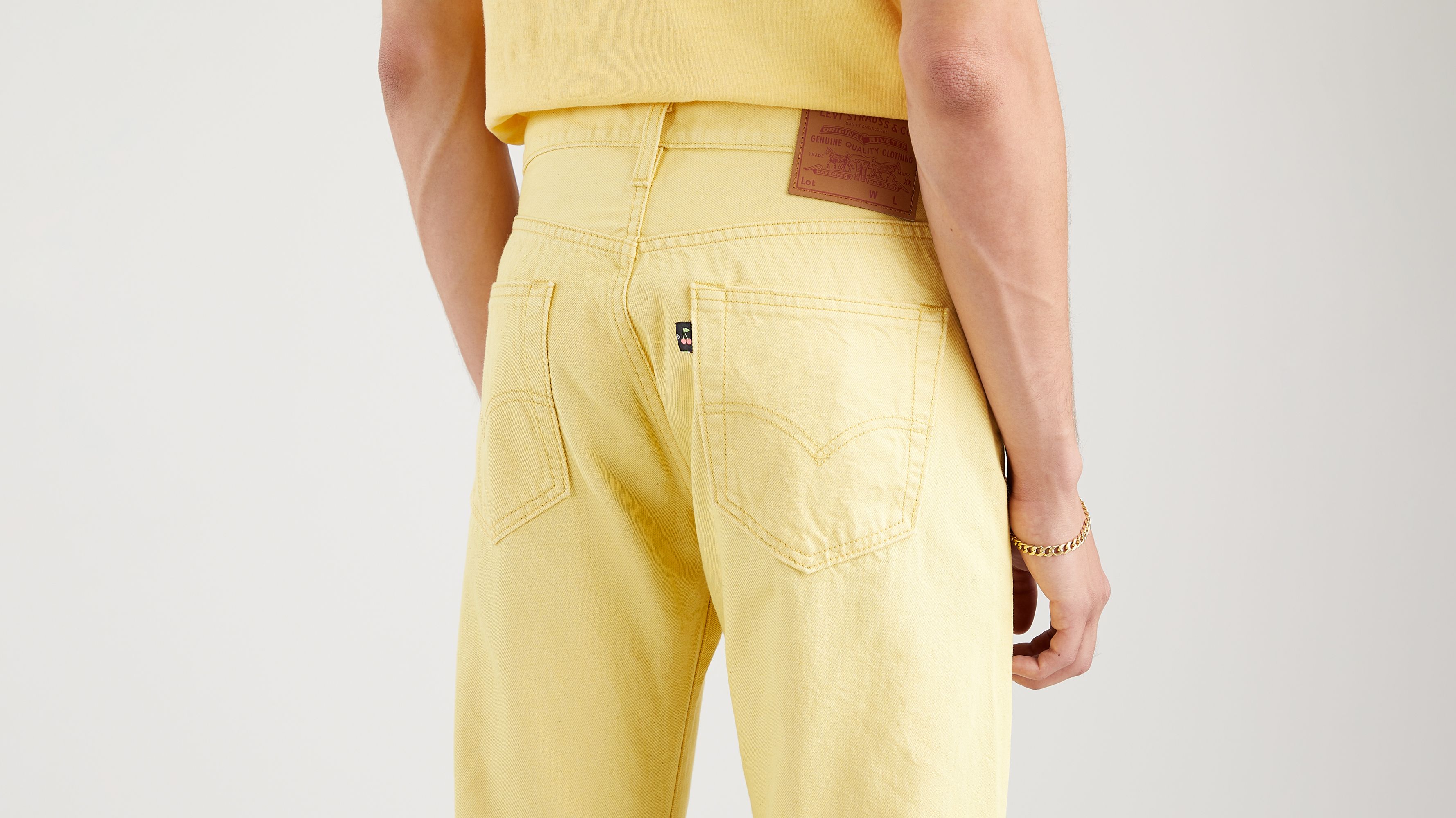 mens yellow levi jeans