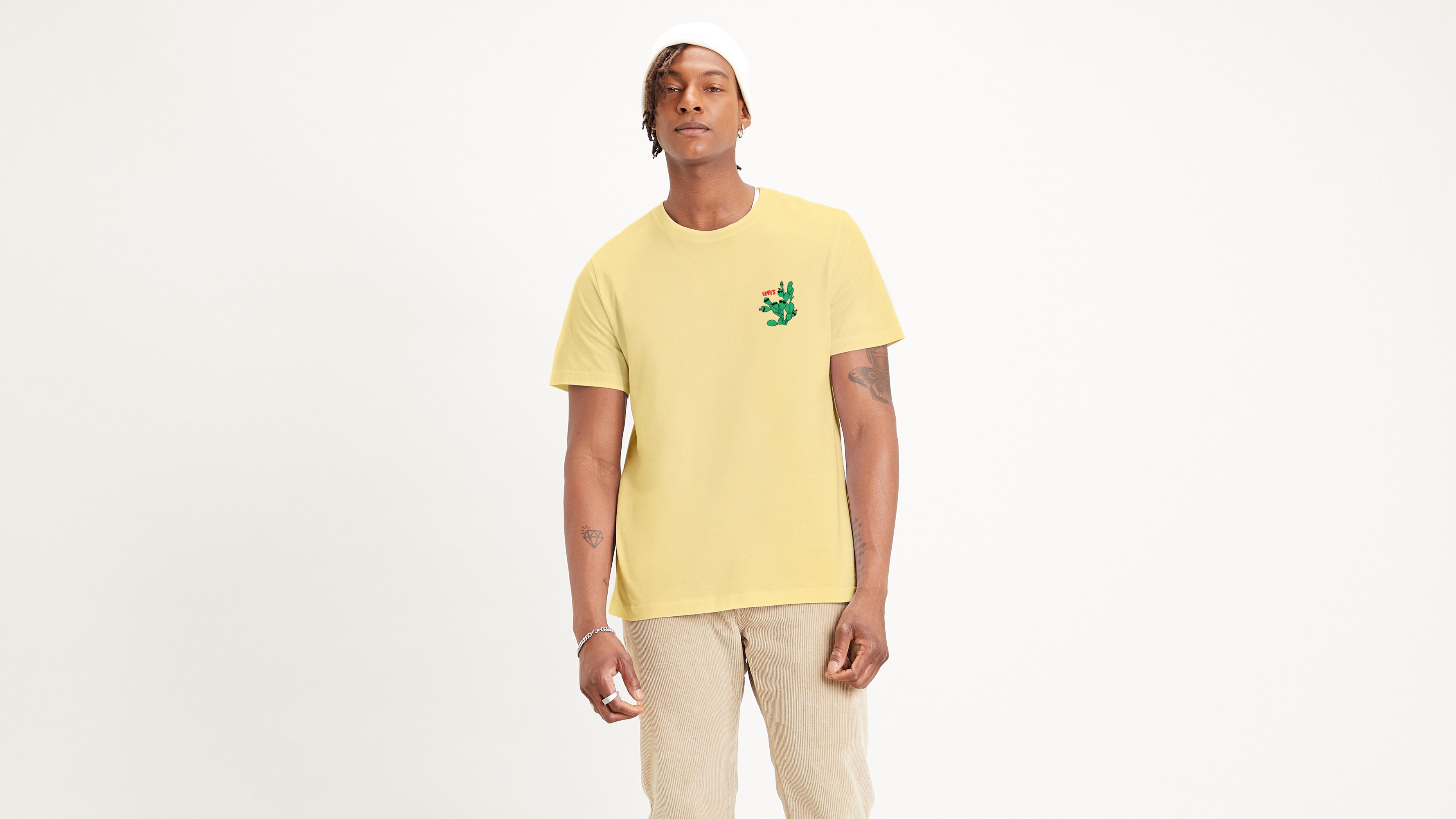 white green and yellow graphic tee