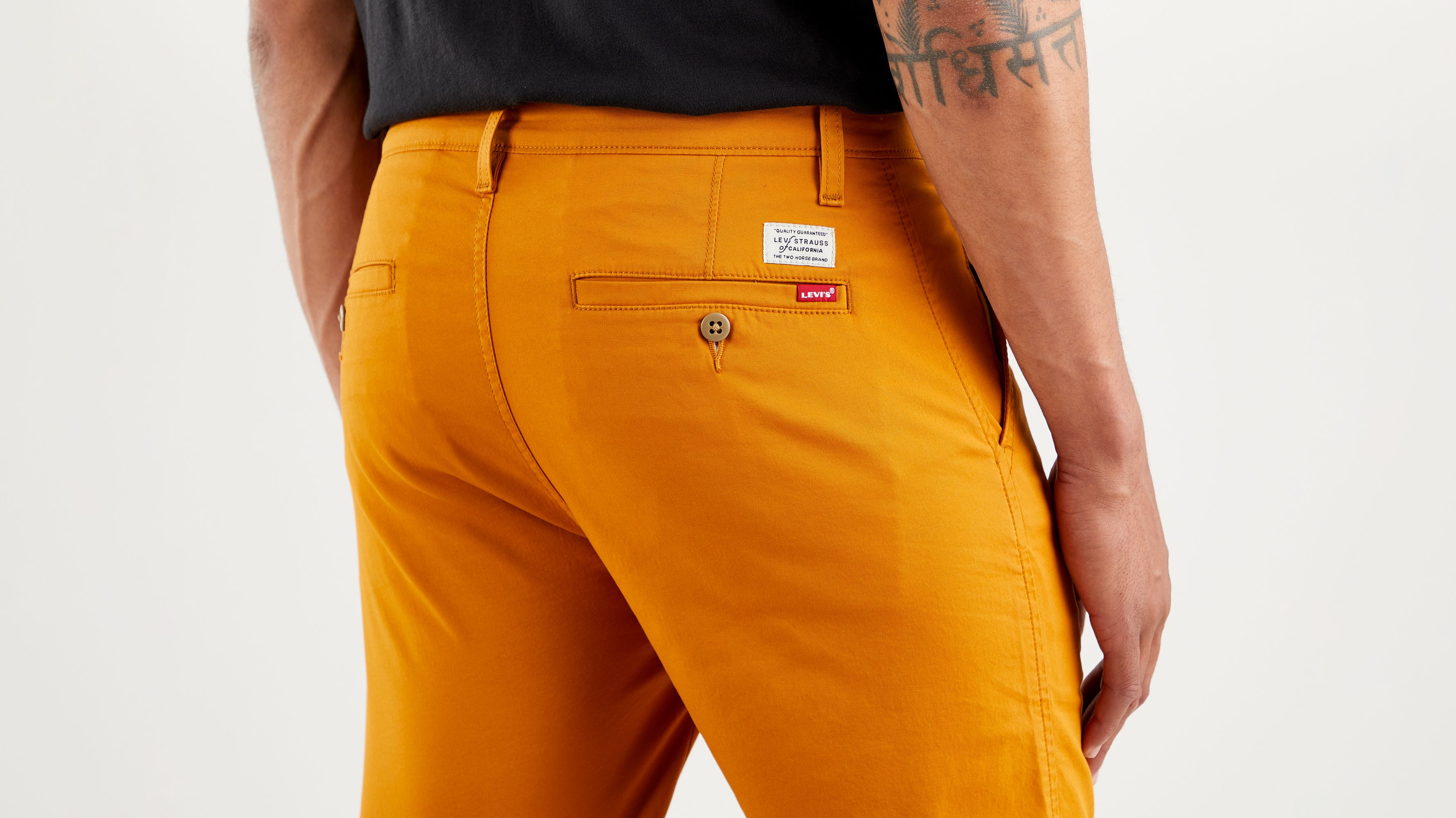 orange levi pants