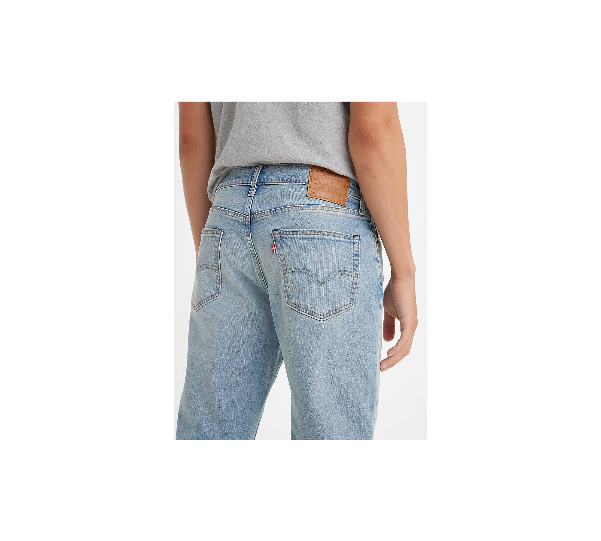 Mid Wash Tapered Athletic Fit Jeans