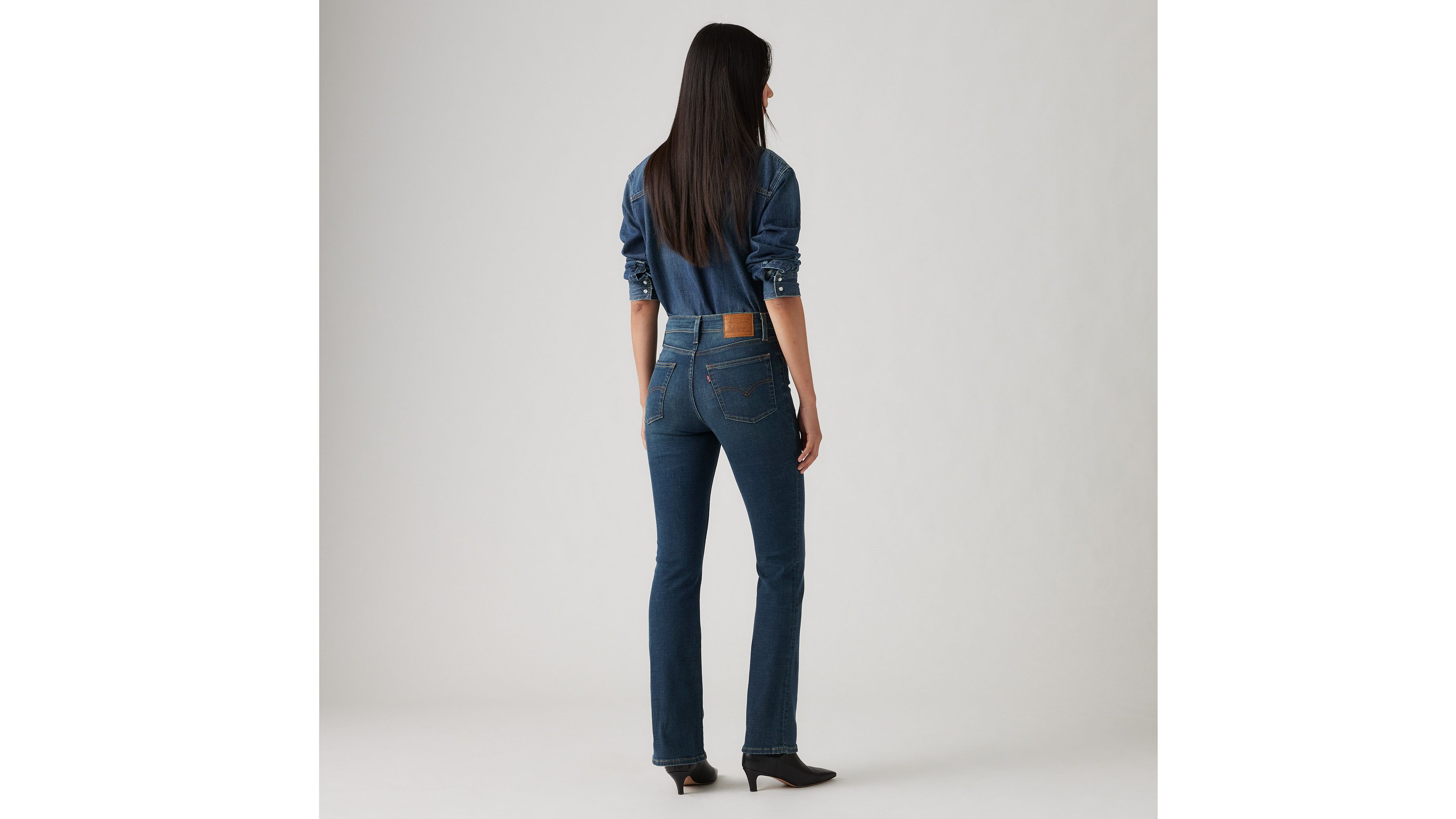 Shop Levi's 725 High Rise Bootcut Jeans In Miles Apart