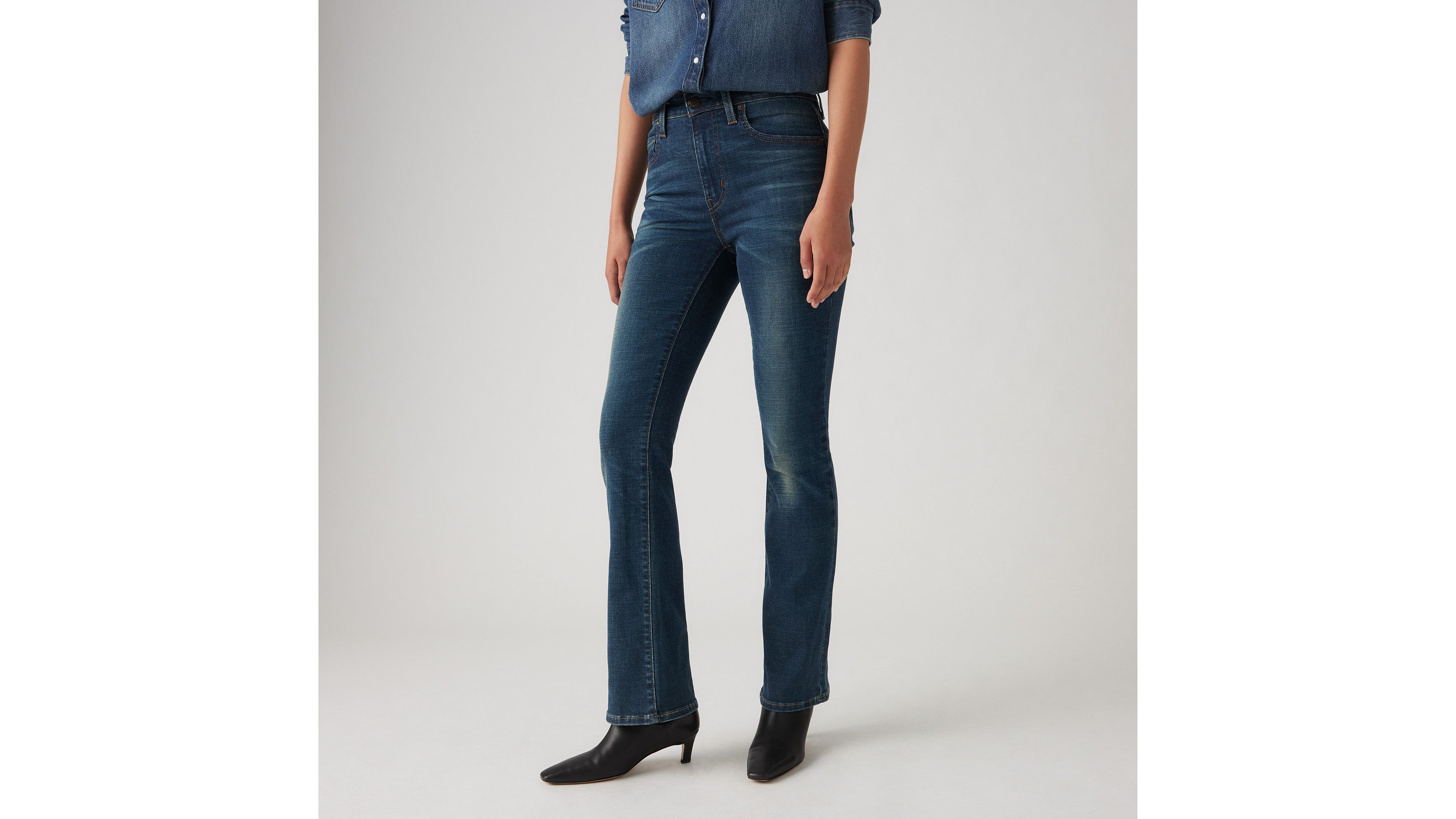 Shop Levi's 725 High Rise Bootcut Jeans In Miles Apart