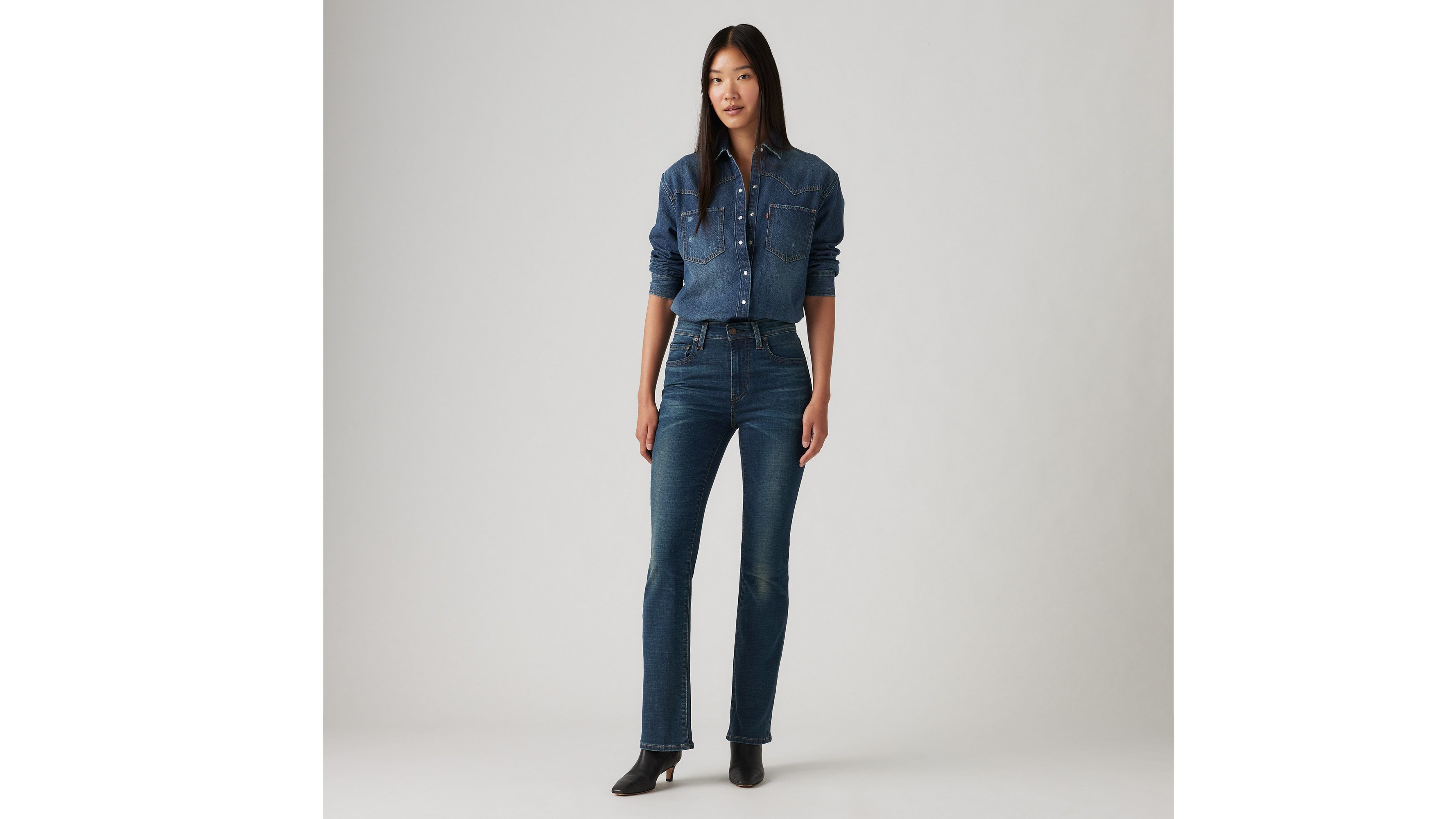 Shop Levi's 725 High Rise Bootcut Jeans In Miles Apart