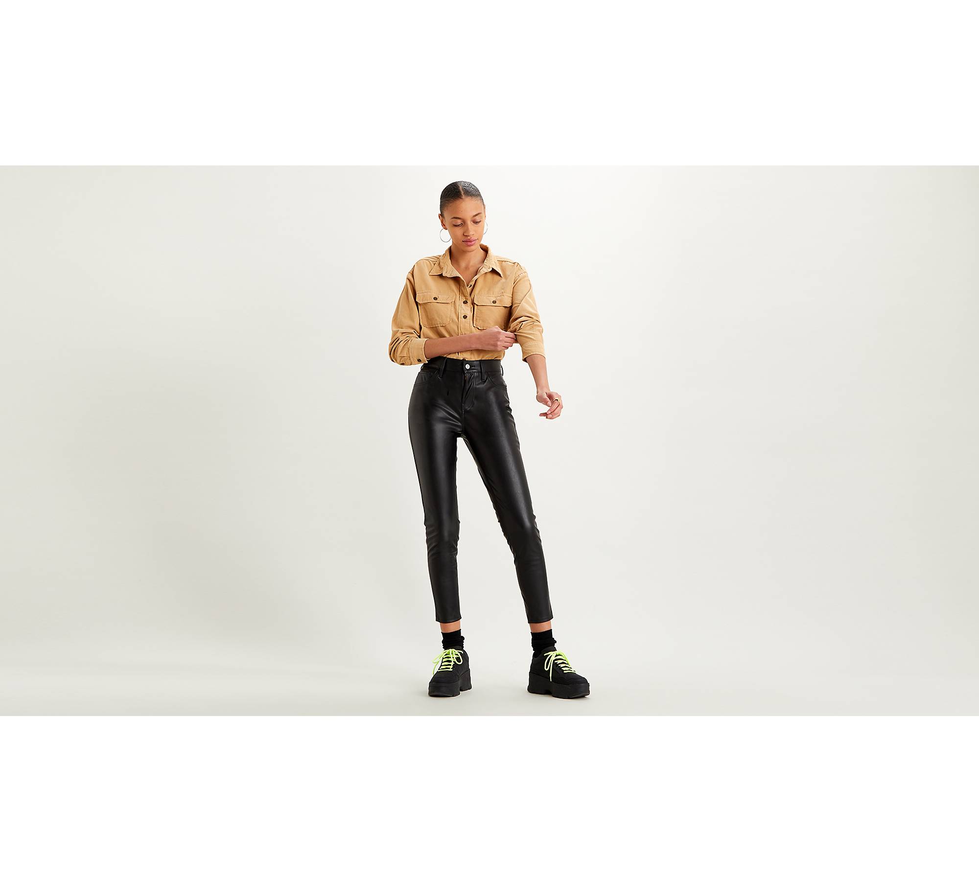 Skinny fit: faux leather trousers - black