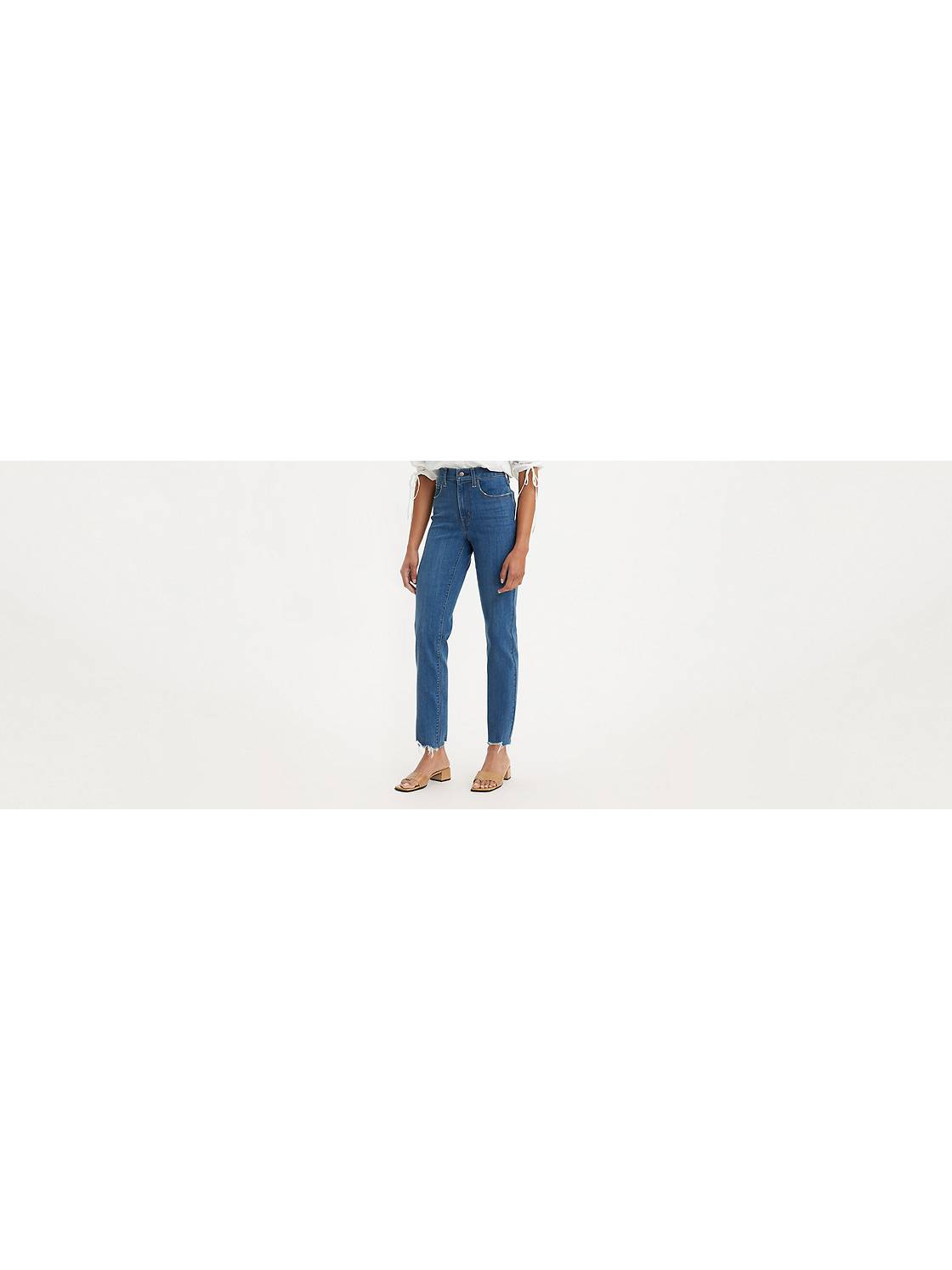Levi's High Waisted Taper Jeans In Light Wash Blue, 60% OFF