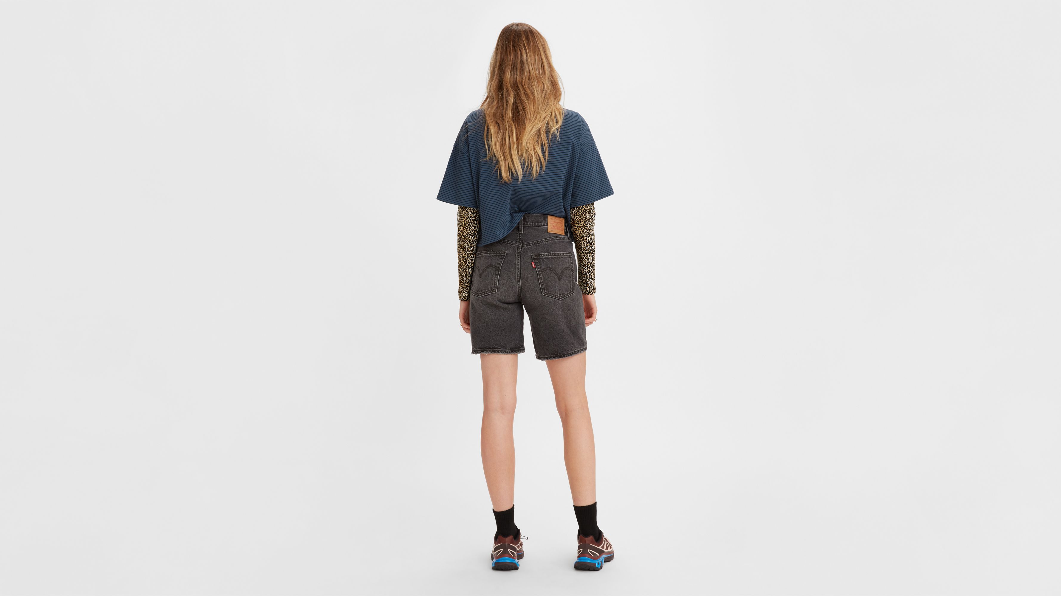 jean shorts worn with black hose  90s fashion, 90s high waisted jeans, 90s  fashion outfits