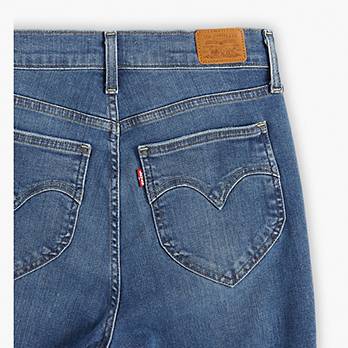 Jeans ceñidos retro de tiro alto 8