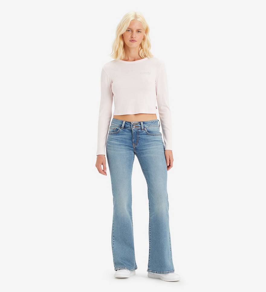 Superlåga utsvängda jeans 1