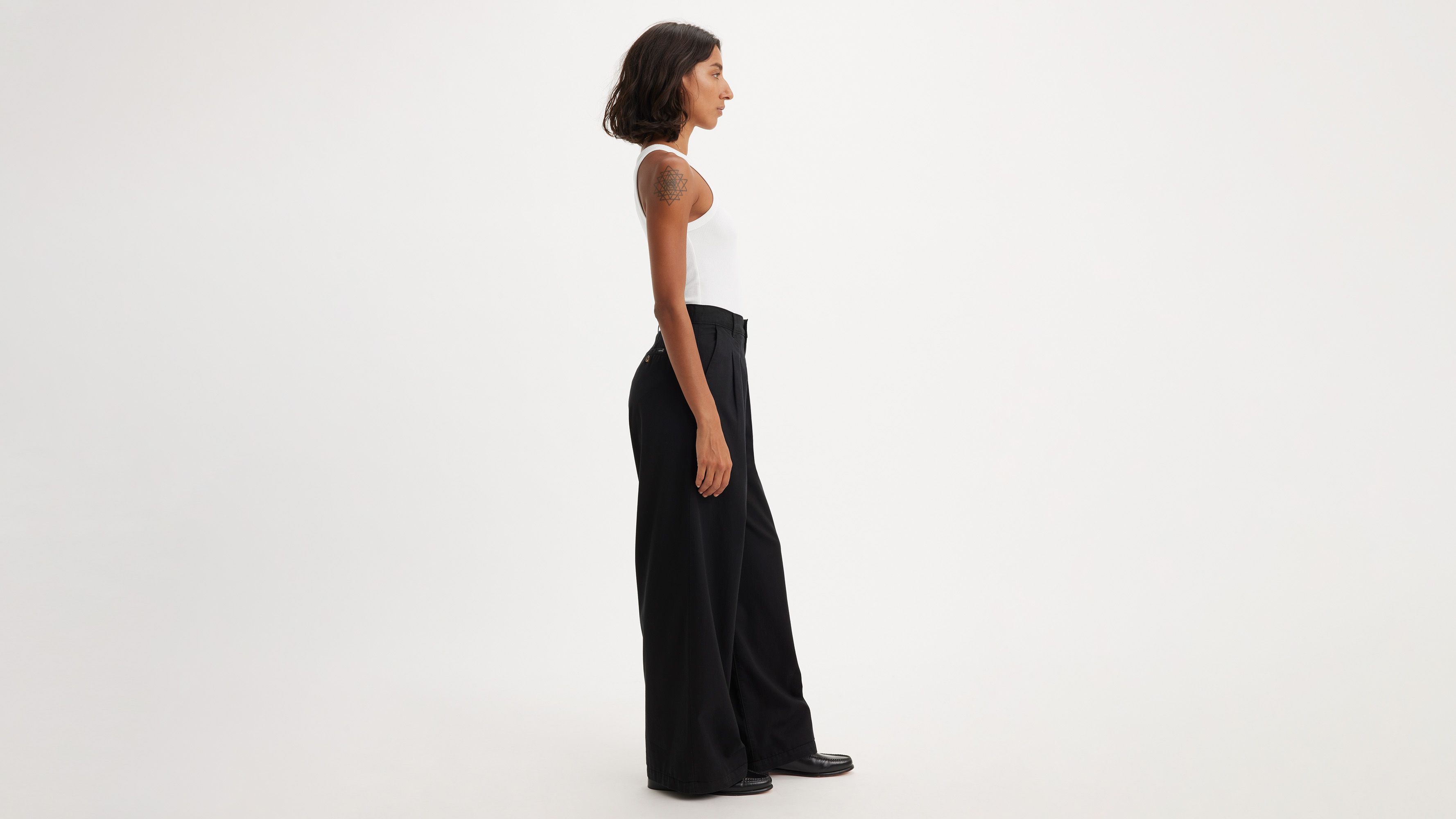 Asymmetric pleated wide leg pants black