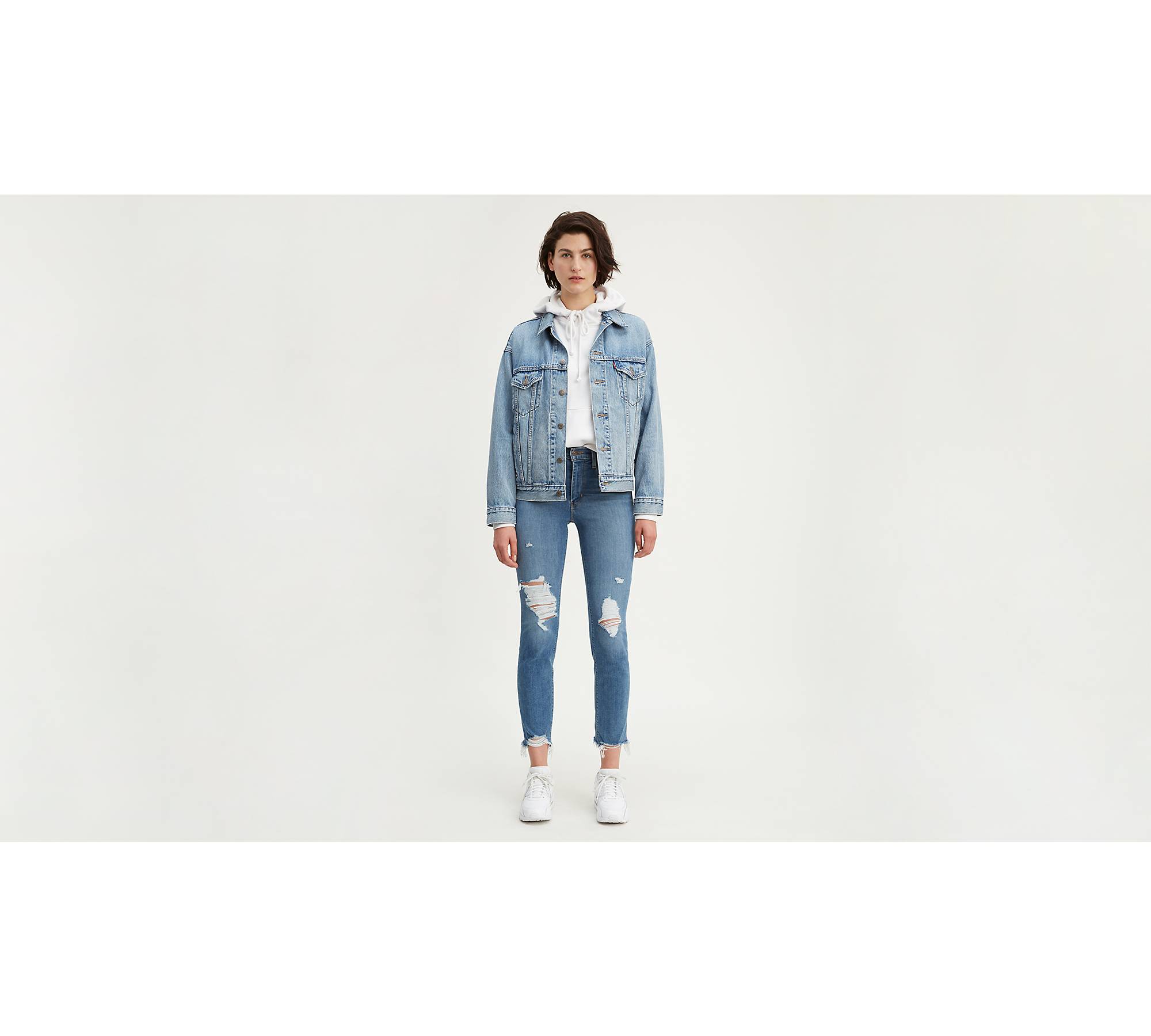 Levi's 724 high rise ripped straight jean in mid wash